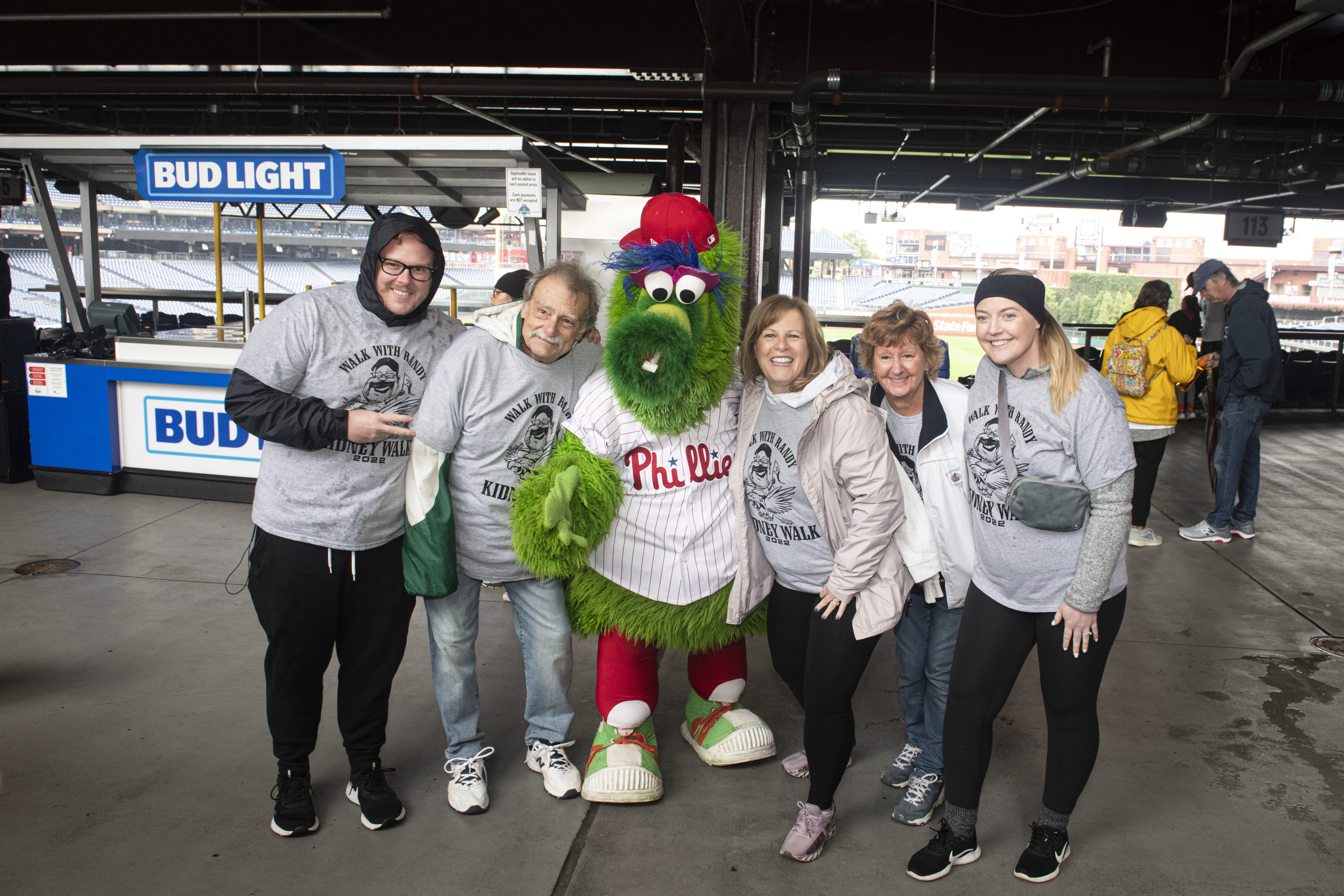 A Group of kidney walkers with the phillie phanatic 