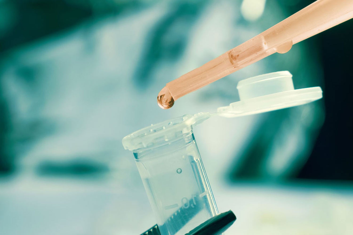 closeup of test tube and pipette in a lab
