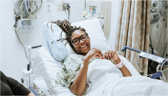 Woman in hospital bed