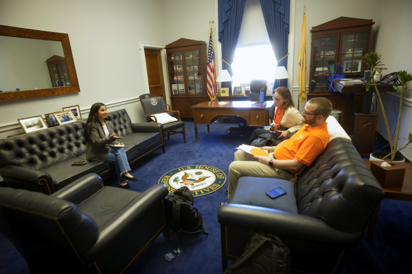  Two kidney advocates speaking with House of Representative aid