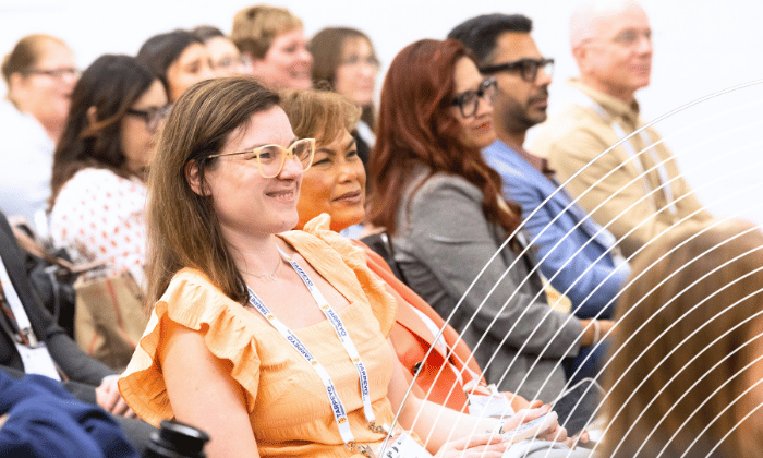 SCM attendees watching presenter