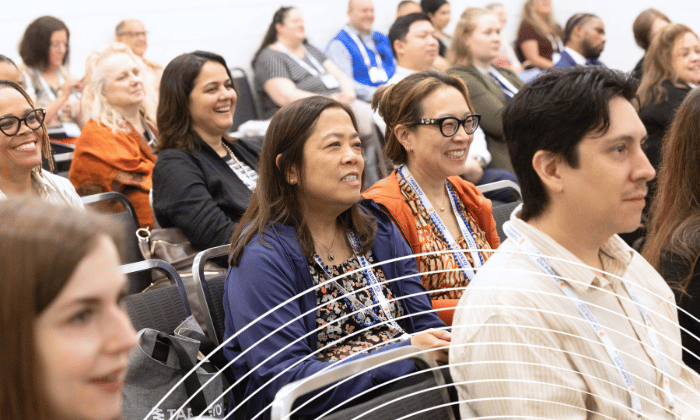 SCM attendees watching a presenter