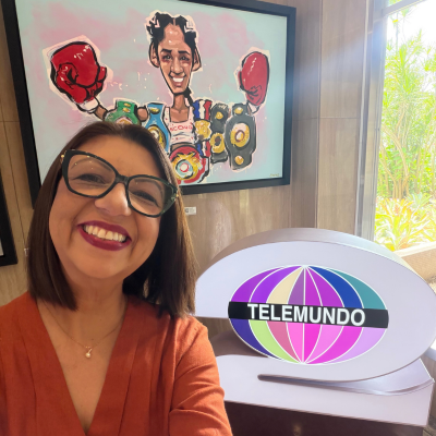 Dr. García Echevarría with Telemundo sign