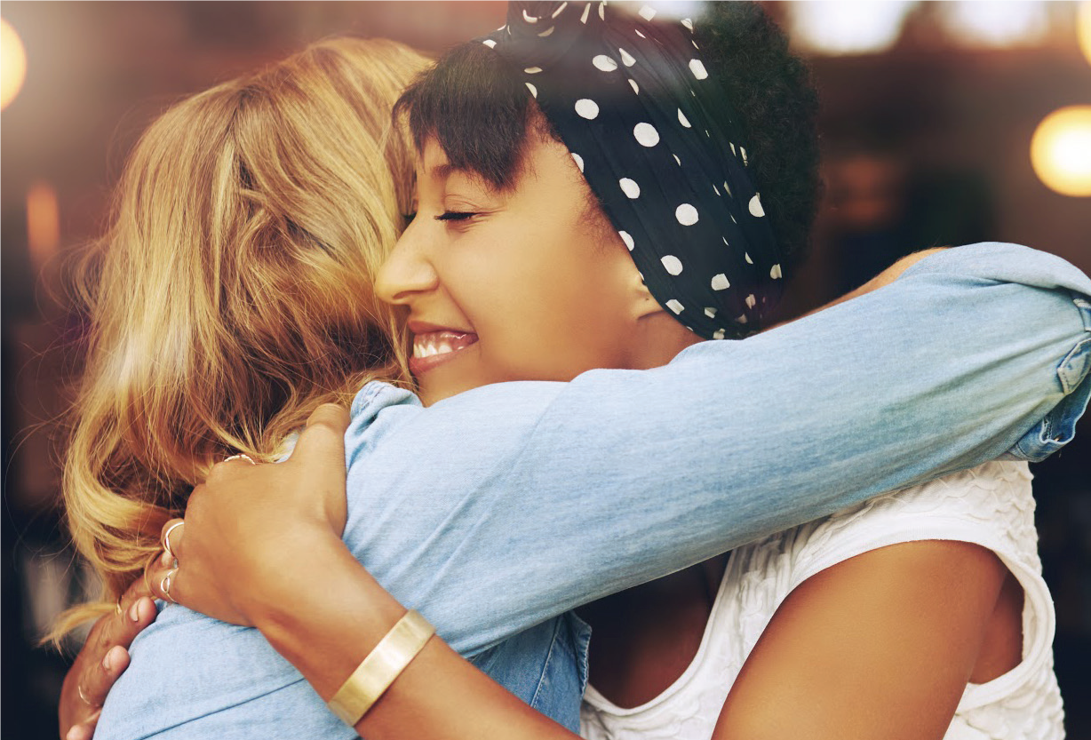 Two women embracing