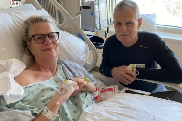 Amy Hewitt and her father after transplant surgery