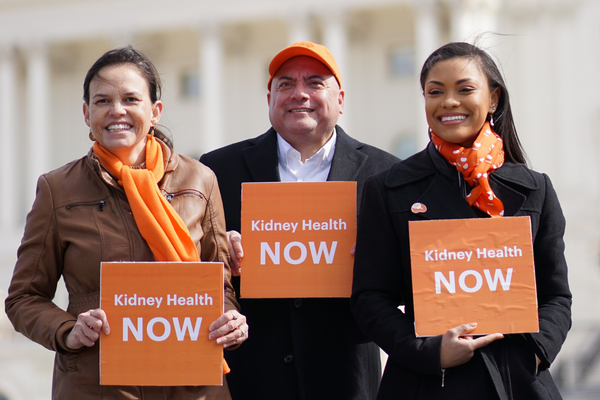 Group of advocates holding signs that say "kidney health now"