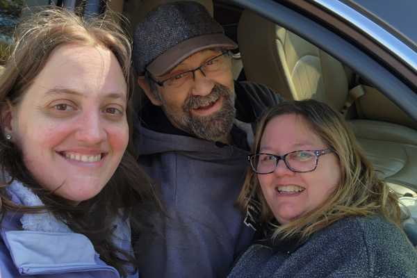 Cheyenne with her father and mother in a car