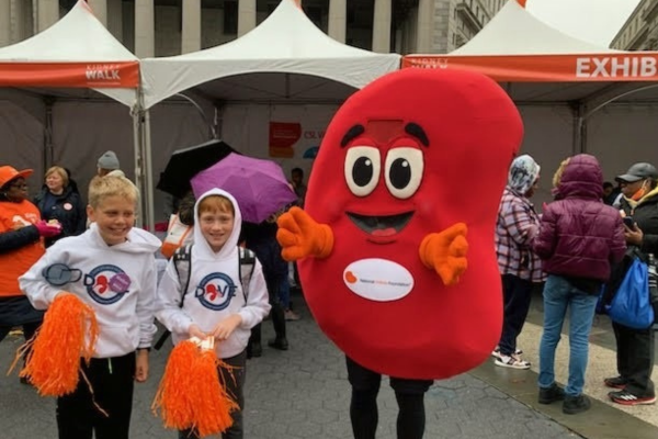 Children wearing DOVE sweaters at a Kidney Walk