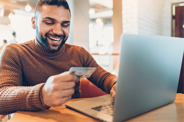 Person happily ordering online