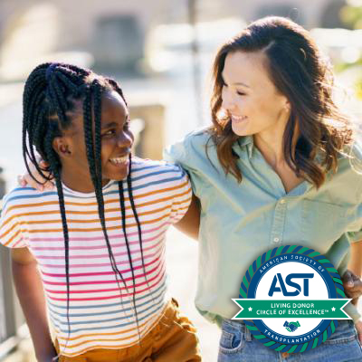 woman and young girl smiling and hugging eachother, with the AST Circle of Excellence medallion logo