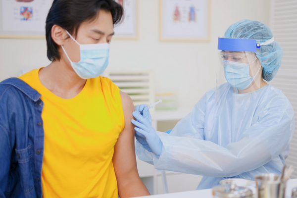 Person receiving vaccination 