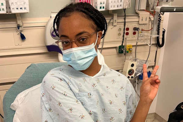 Jada Sasha giving peace sign after transplant