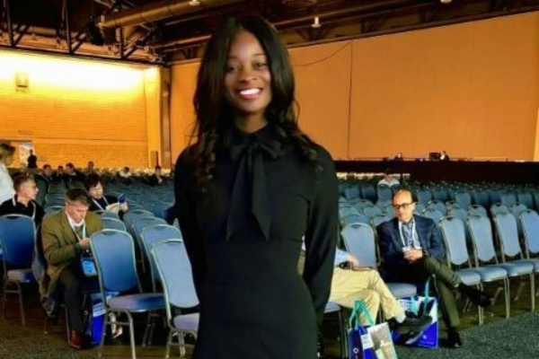 Janet Tennyson smiling at a conference