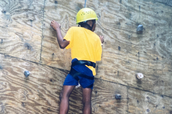 Josh Wilder climbing at kidney camp