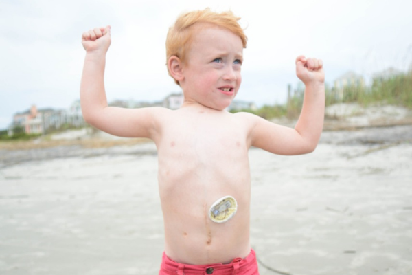 Toddler Logan Blevins at the beach