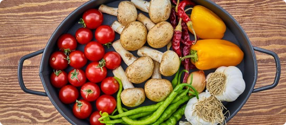 Monday Campaigns vegetables in a skillet
