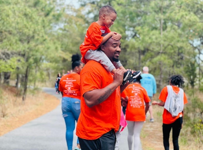 Rob Moore and little man at Kidney Walk