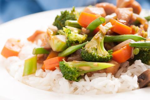 chicken and mixed vegetable stir fry over rice