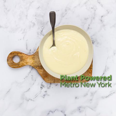 mustard sauce in a bowl, have a plant logo
