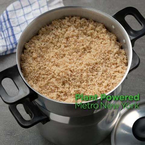 Pot of cooked bulgar wheat, with Plant Powered Metro New York logo