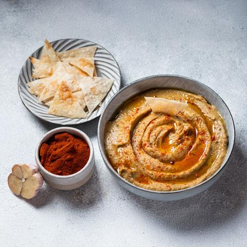 Eggplant dip with pita chips, paprika and garlic