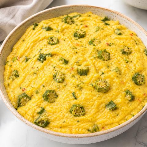 Bowl of cornmeal and okra coo-coo
