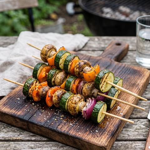 Grilled veggie kabobs with zucchini, peppers, mushrooms, red onions