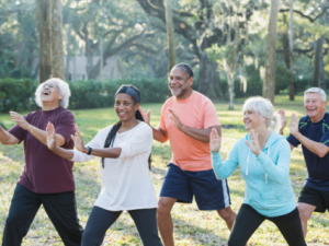 Group of seniors exercising in a park