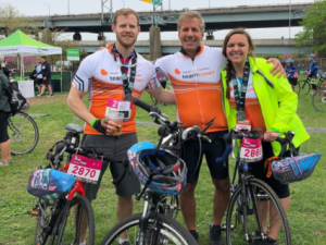 Three happy Team Kidney Moves members on bikes