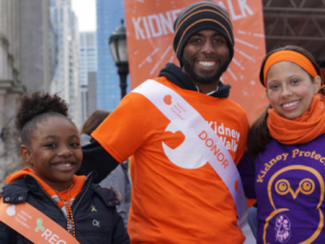 Living donor with children smiling at kidney walk