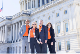 Four kidney health advocates in front of Capitol building