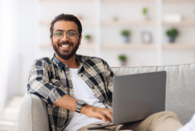 Person smiling while typing