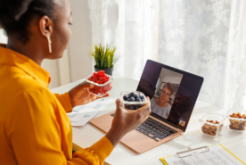 Kidney patient working with dietitian through video chat