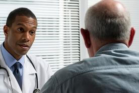 doctor talking to patient