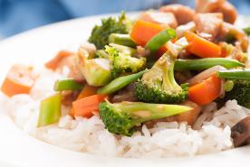 chicken and mixed vegetable stir fry over rice