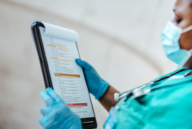 Healthcare provider looking at paperwork