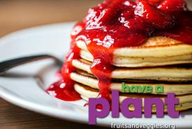 Pancakes with strawberry sauce, have a plant logo