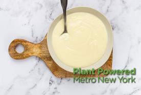 mustard sauce in a bowl, have a plant logo