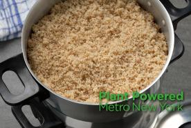 Pot of cooked bulgar wheat, with Plant Powered Metro New York logo