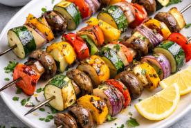 Grilled vegetable kebabs with zucchini, mushrooms, bell peppers, and onion