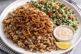 Mujadara and Tabbouleh on a plate with tahini sauce on the side