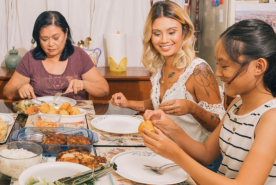 Multigenerational family enjoying dinner together