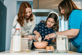 Three generations cooking together