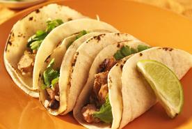 Chicken Tacos with lime wedges