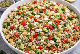 quinoa salad with chickpeas, tomatoes, cucumber, feta, onion, parsley