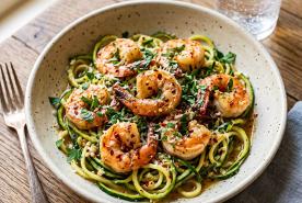Shrimp scampi served over zucchini noodles