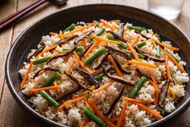 Japanese-style sushi rice with julienned vegetables and shiitakes over the top
