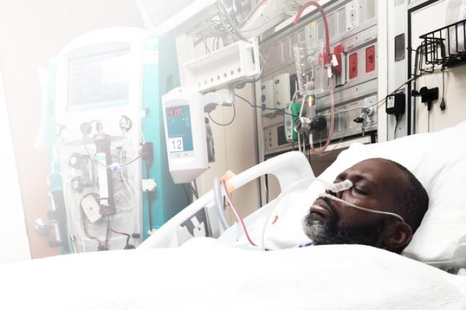 Darwin in hospital hooked up to ventilator. 