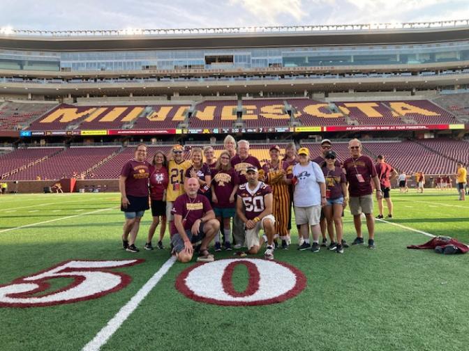 Photo of Doobie and teammates at the MN gopher game