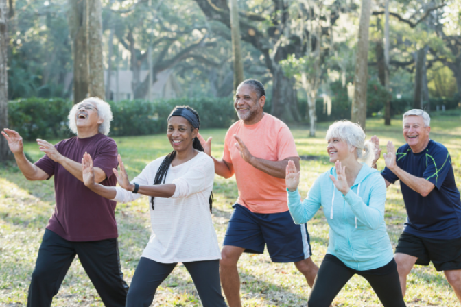 Group of seniors exercising in a park